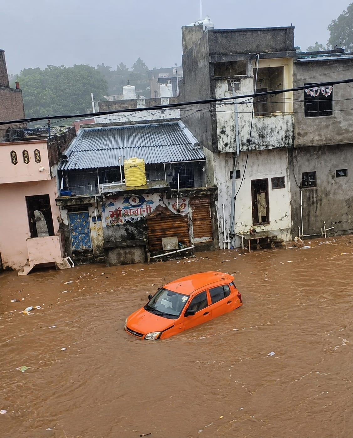 WhatsApp Image 2026-07-04 at 11.29.33 AM मूसलधार बारिश से सेंधवा - मूसलधार बारिश से सेंधवा बेहाल: घरों में घुसा पानी, सड़कें डूबीं, कई गांवों का संपर्क टूटा; पु…